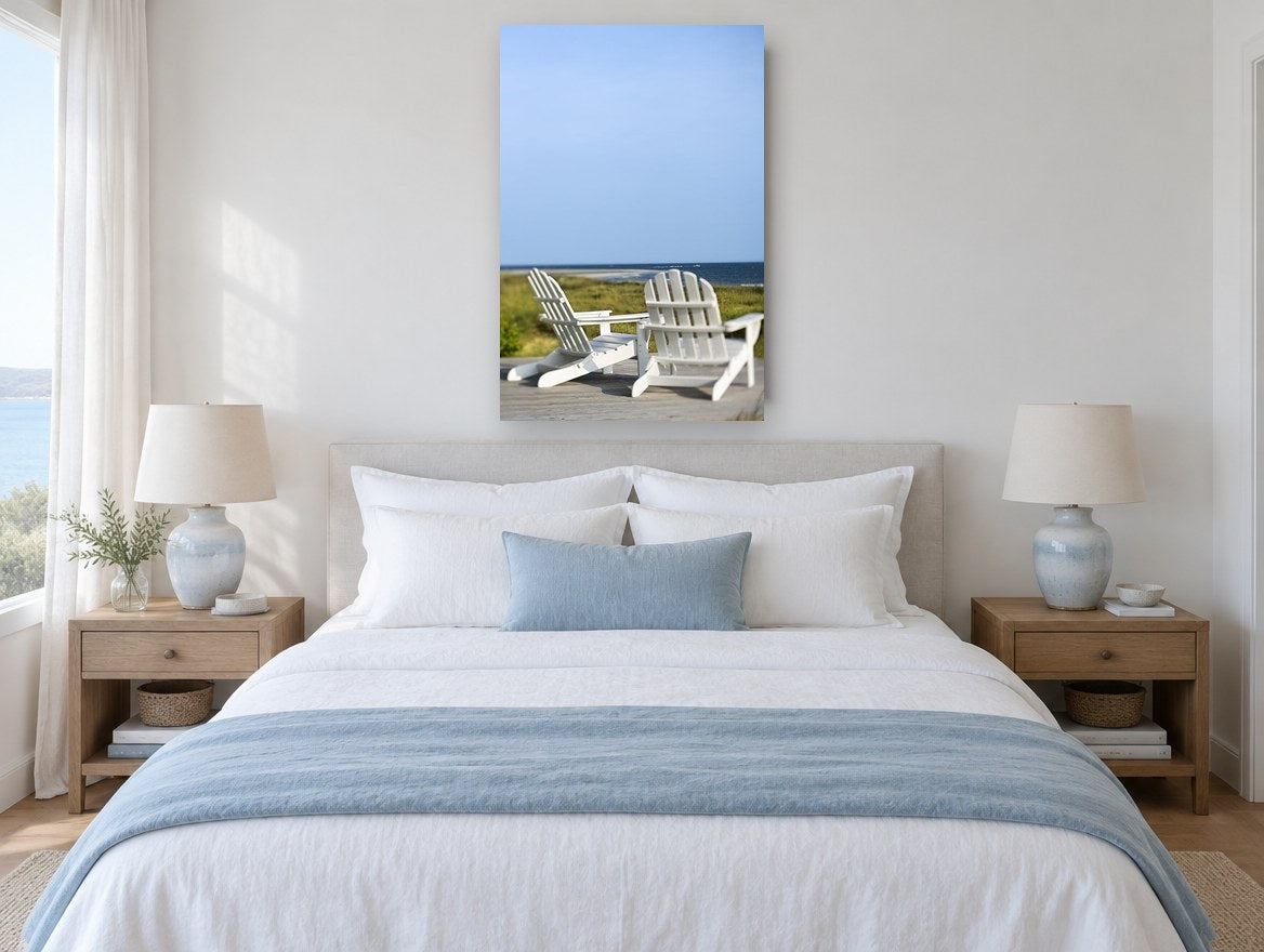 Two White Deck Chairs coastal canvas print on the wall of a coastal bedroom