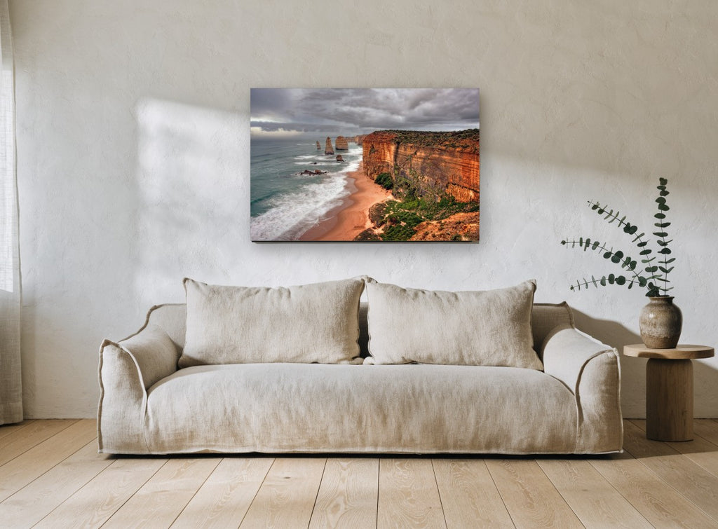 Ochre Cliffs Storm Coast coastal canvas print on the wall of a living room
