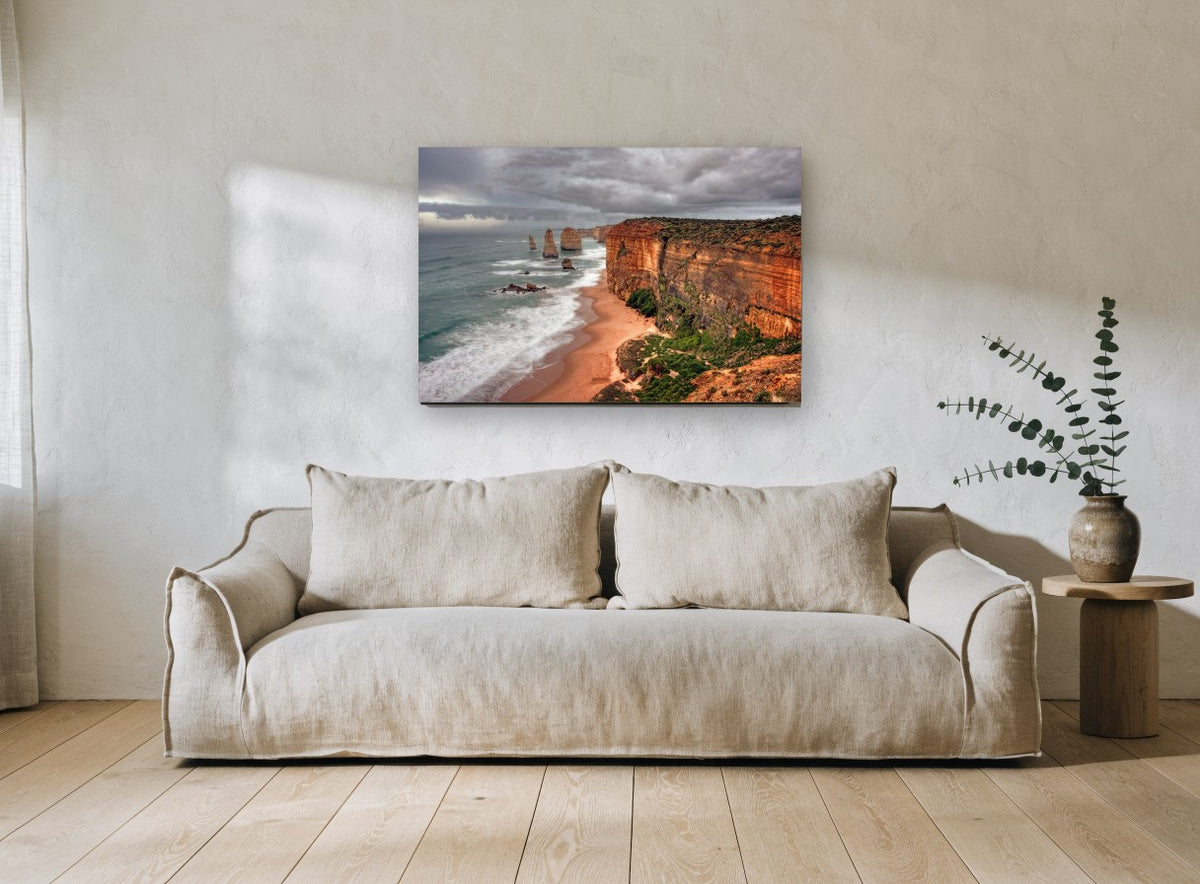 Ochre Cliffs Storm Coast coastal canvas print on the wall of a living room