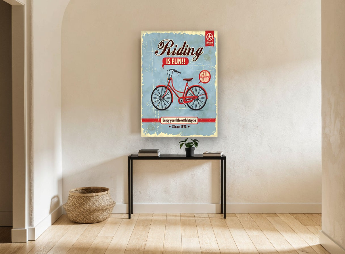 Riding Is Fun vintage canvas print on the wall of a hallway