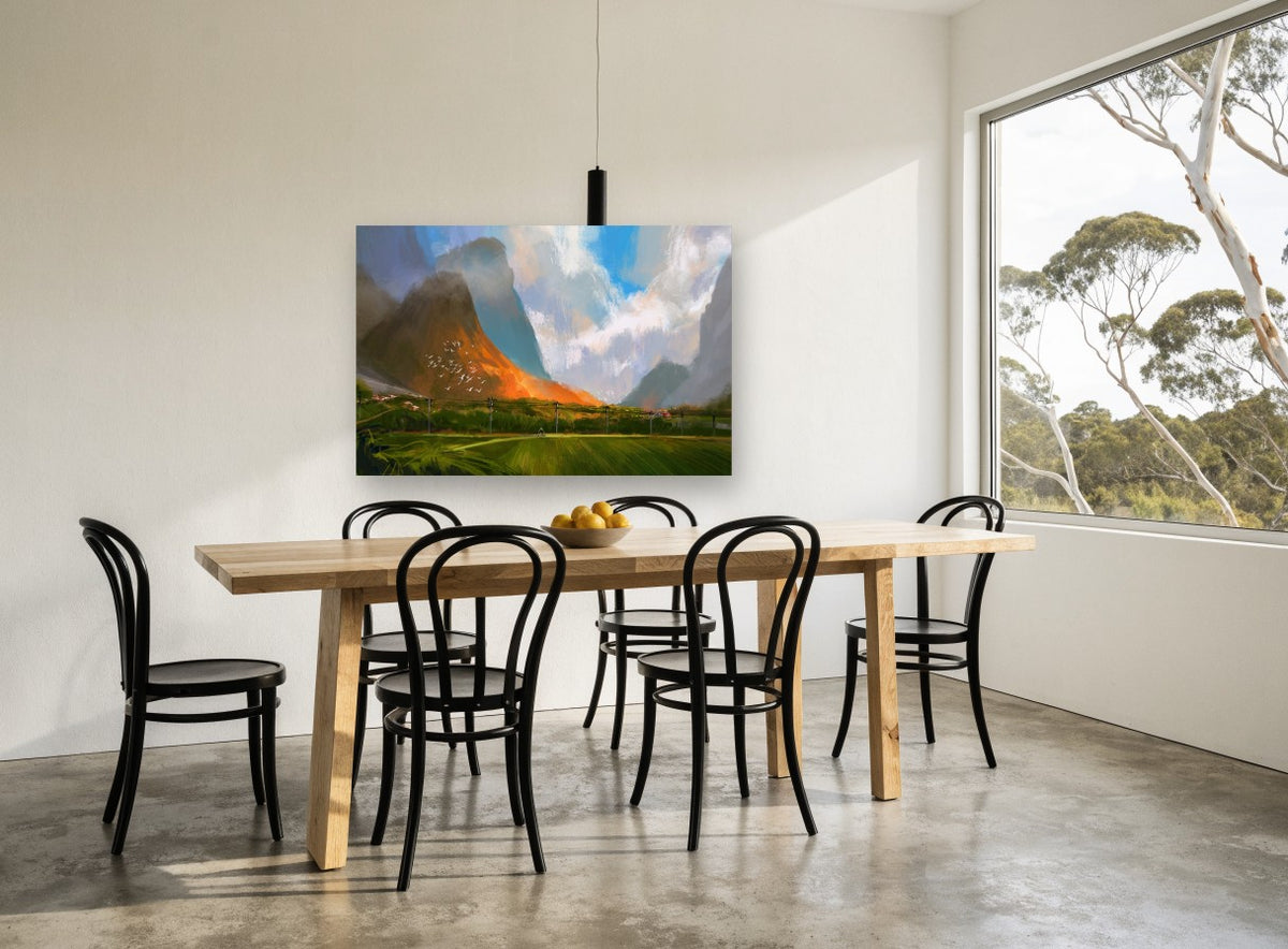 Sunlit Peak Over Green Valley landscape canvas print on the wall of a dining room