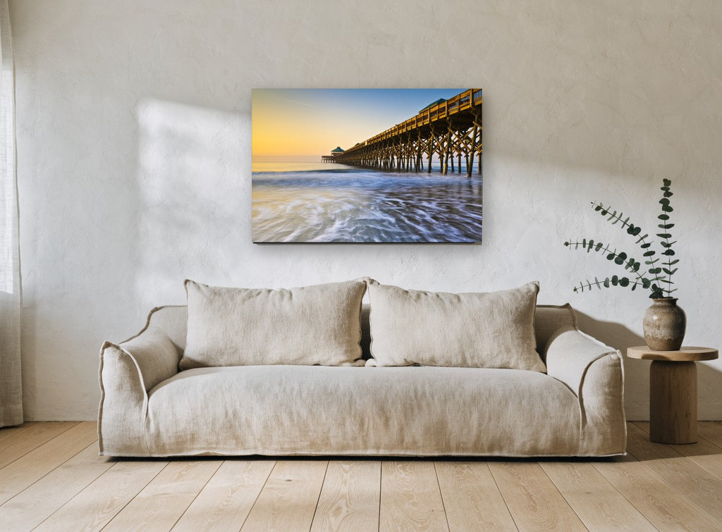 Folly Beach Dawn Pier coastal canvas print on the wall of a living room