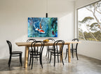 Koi in Blue Water animal canvas print on the wall of a dining room