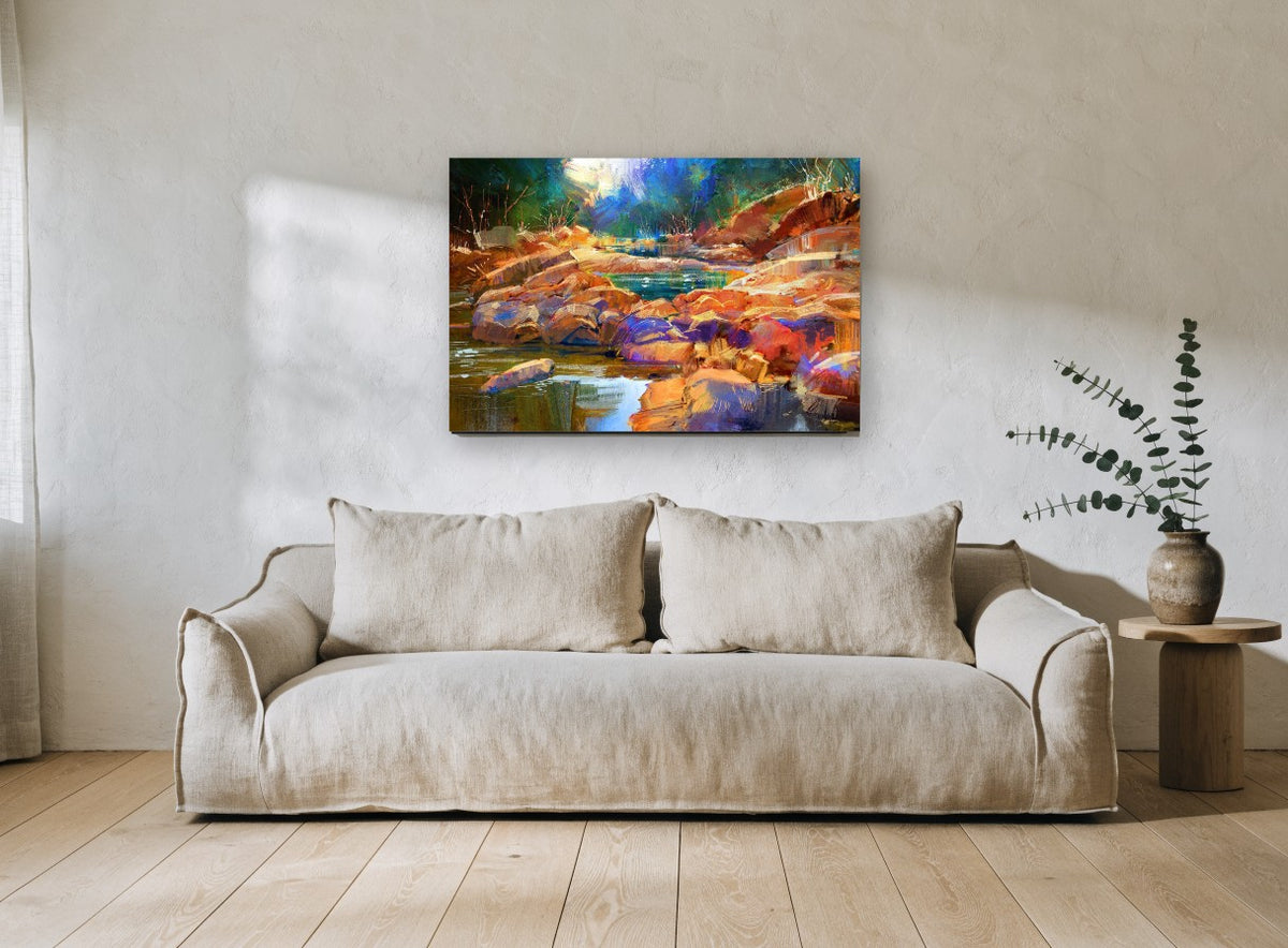 Amber Stones Creek landscape canvas print on the wall of a living room