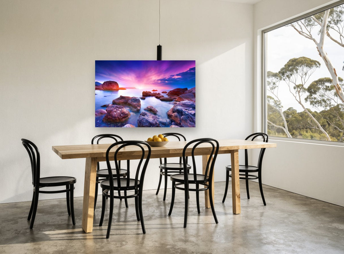 Violet Dusk Rocks coastal canvas print on the wall of a dining room