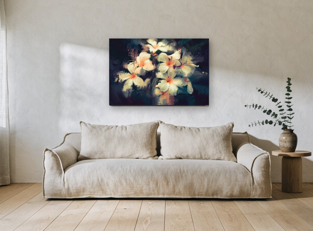 Frangipani Glow at Dusk floral canvas print on the wall of a living room
