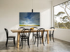Windmill Under Streaking Sky landscape canvas print on the wall of a dining room