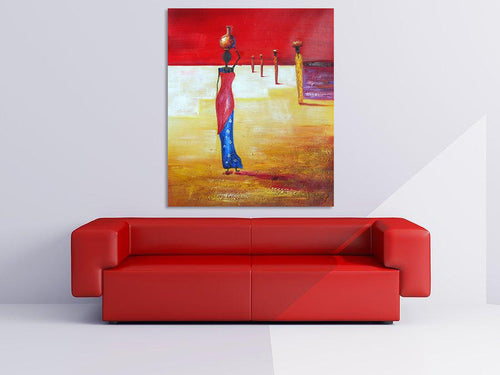 African Women oil painting hanging above a sofa in a living room