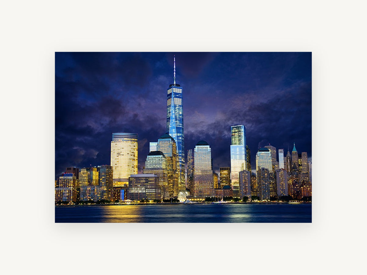 Lower Manhattan Storm Glow, lower manhattan skyline at dusk photograph, city canvas wall art print, front view