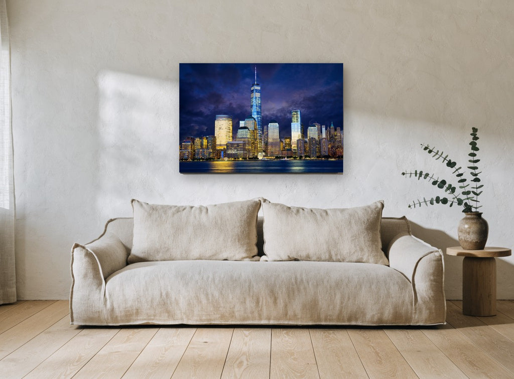 Lower Manhattan Storm Glow city canvas print on the wall of a living room