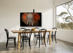 Red Dust Elephant animal canvas print on the wall of a dining room