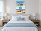 Rail to the Seaside vintage canvas print on the wall of a coastal bedroom