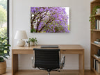 Jacaranda Canopy Bloom floral canvas print on the wall of a study