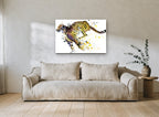 Sprinting Cheetah Splash animal canvas print on the wall of a living room