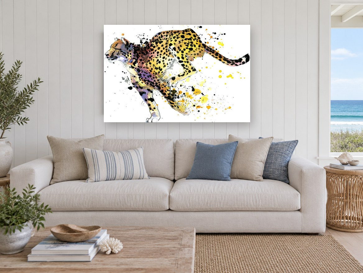 Sprinting Cheetah Splash animal canvas print on the wall of a beach house living room