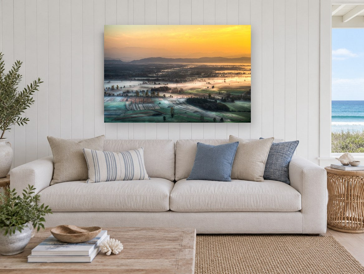 Fog Over Farmland landscape canvas print on the wall of a beach house living room