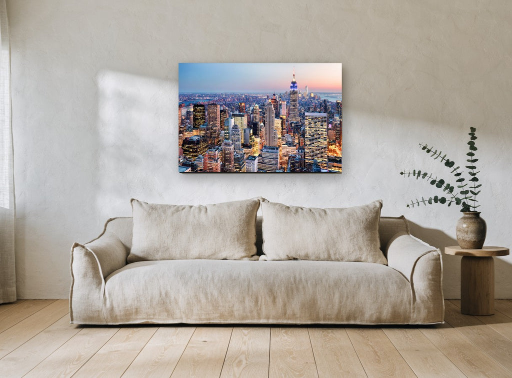 Midtown Dusk Glow city canvas print on the wall of a living room