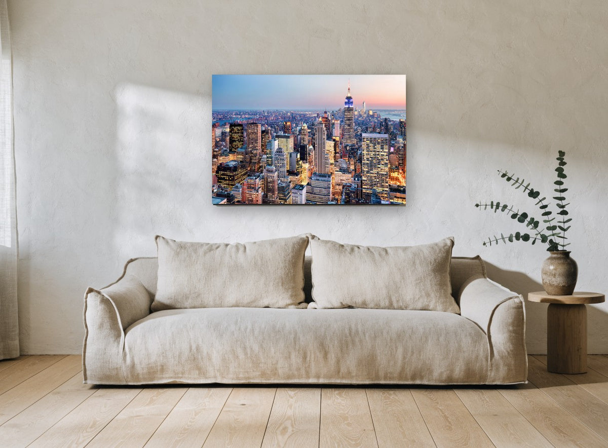 Midtown Dusk Glow city canvas print on the wall of a living room