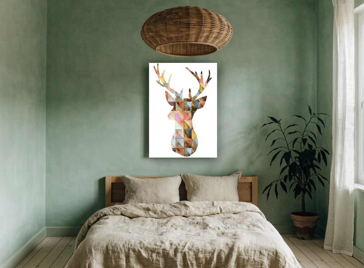 Patchwork Stag Silhouette animal canvas print on the wall of a bedroom