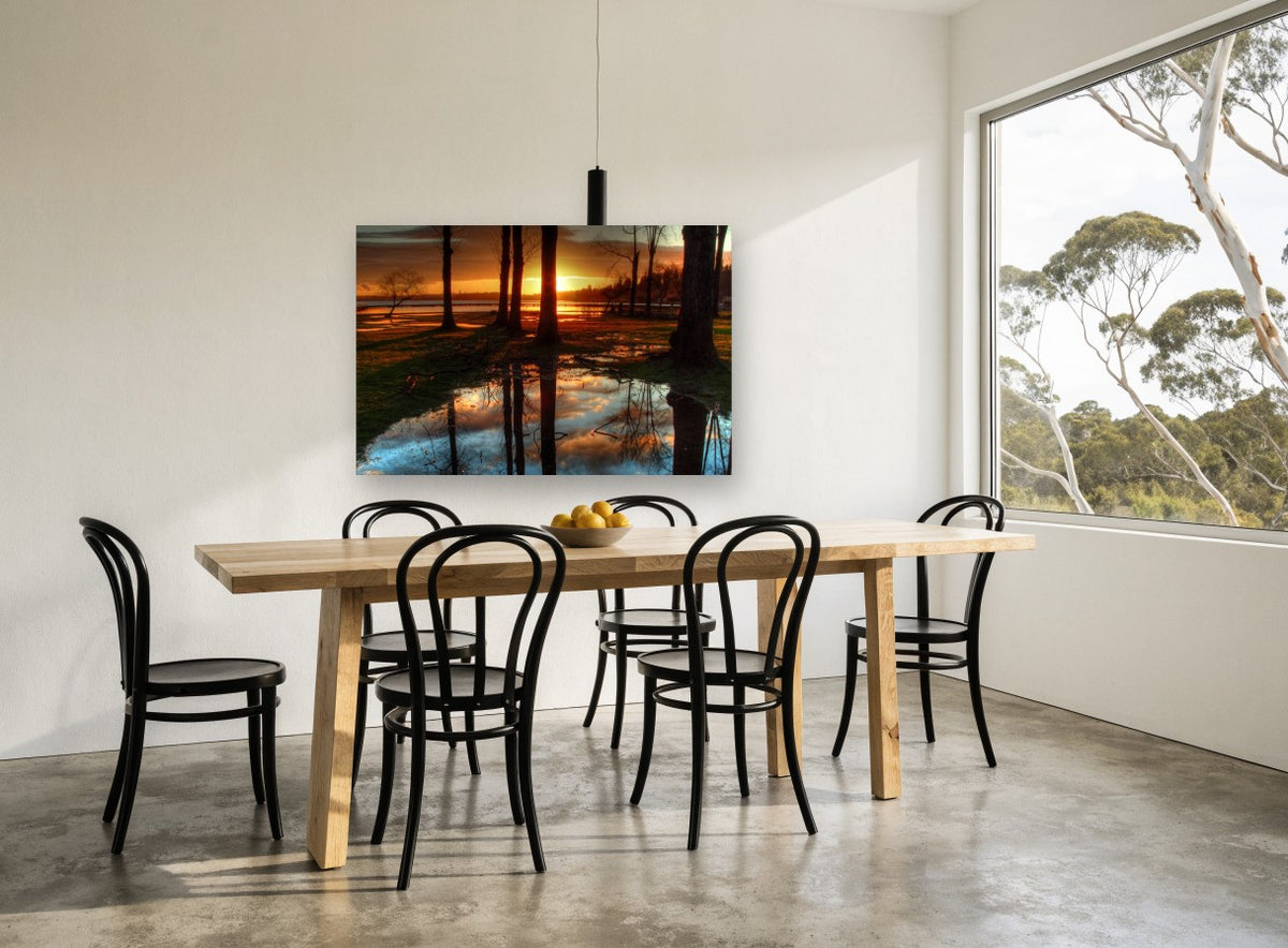 Sunset Puddle Reflections landscape canvas print on the wall of a dining room