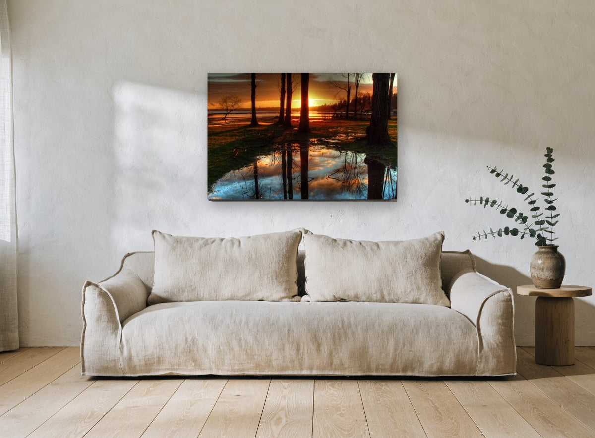 Sunset Puddle Reflections landscape canvas print on the wall of a living room