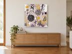 Mauve Garden Birds floral canvas print on the wall of a living room above a sideboard
