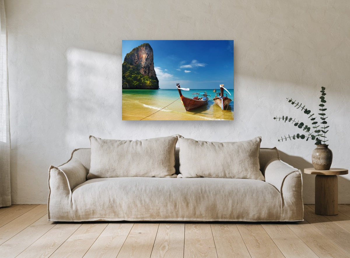 Longtails on Golden Shore coastal canvas print on the wall of a living room