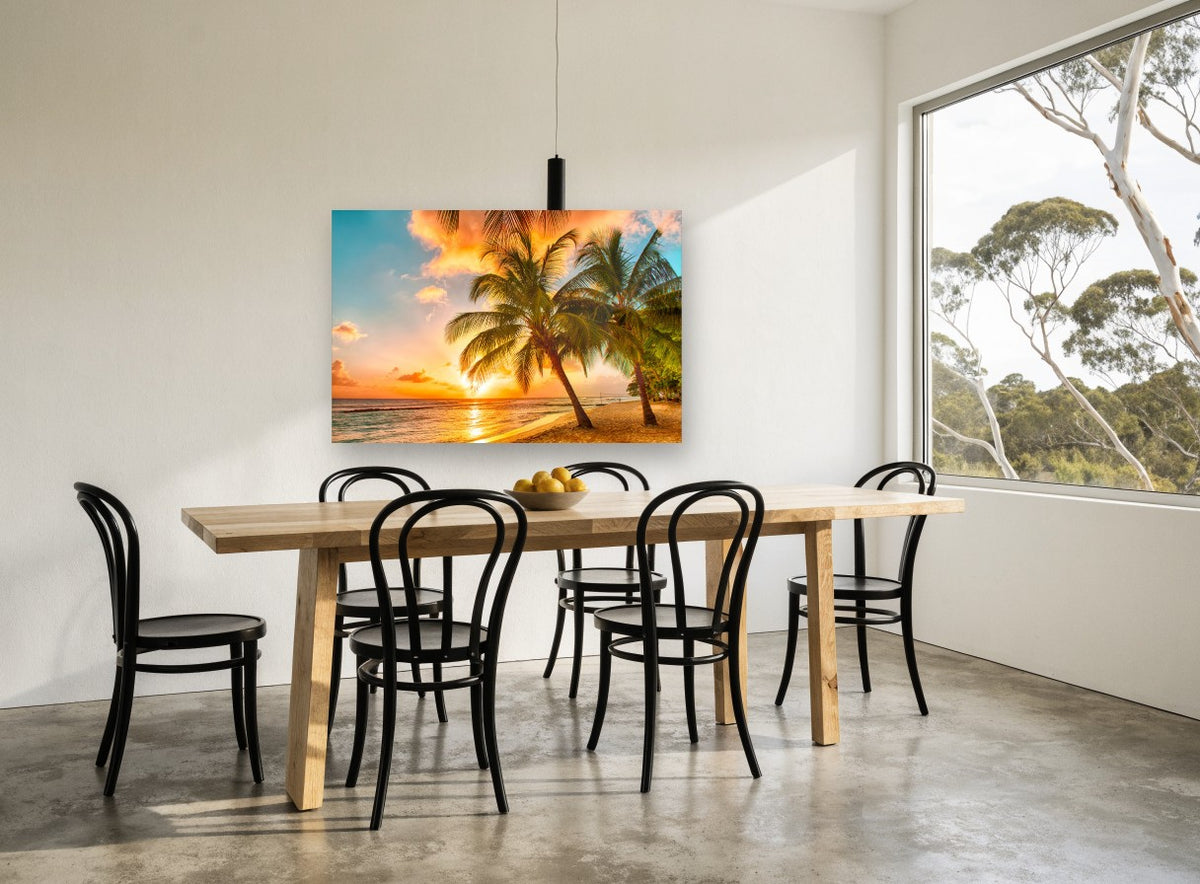 Golden Palms at Sunset coastal canvas print on the wall of a dining room