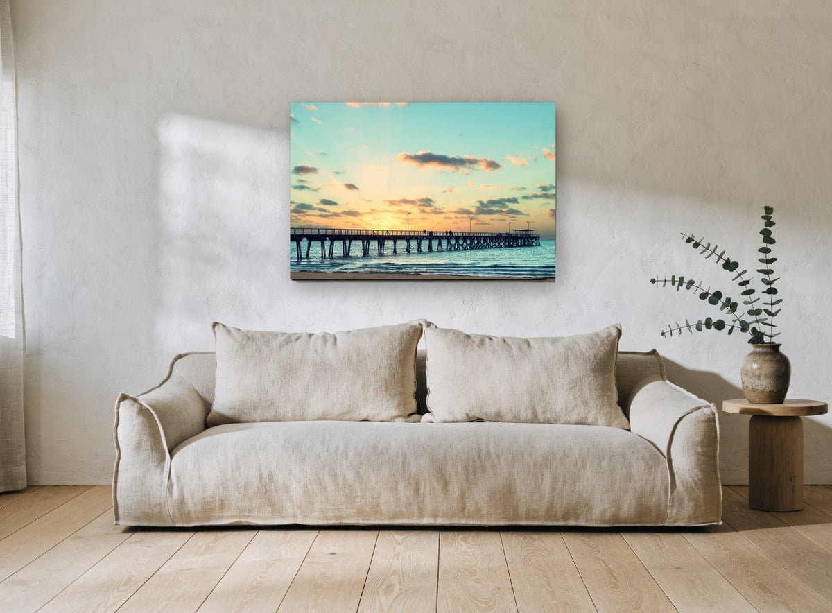 Jetty at Peach Dusk coastal canvas print on the wall of a living room