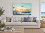 Jetty at Peach Dusk coastal canvas print on the wall of a beach house living room