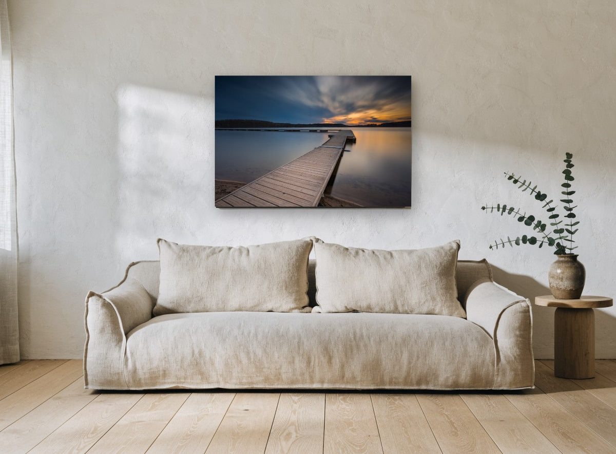 Dusk Along the Jetty landscape canvas print on the wall of a living room