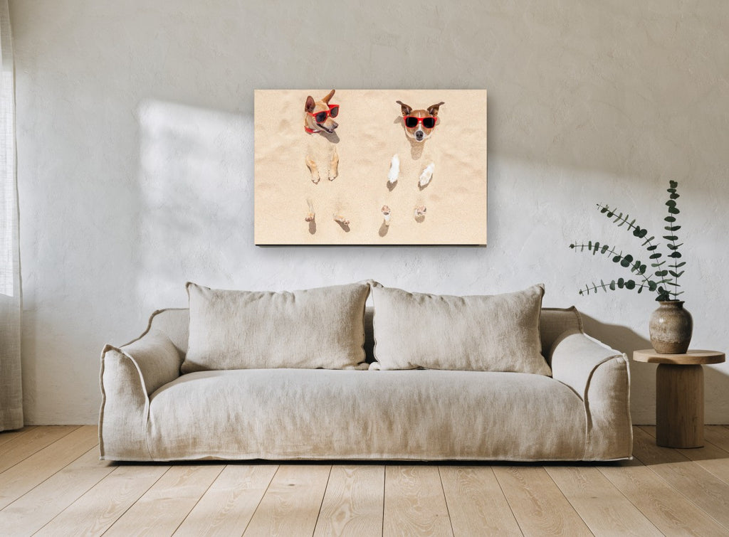 Sandy Beach Buddies animal canvas print on the wall of a living room