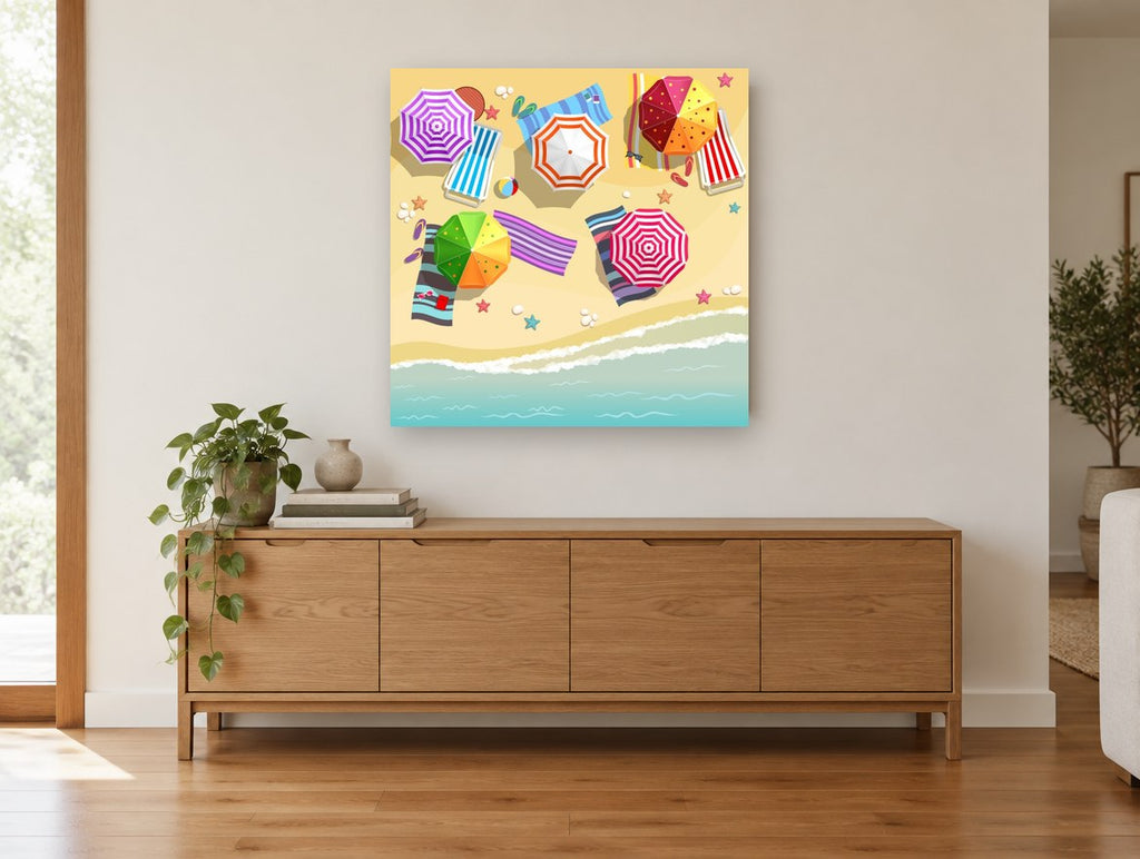 Striped Umbrella Shoreline coastal canvas print on the wall of a living room above a sideboard