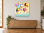Striped Umbrella Shoreline coastal canvas print on the wall of a living room above a sideboard