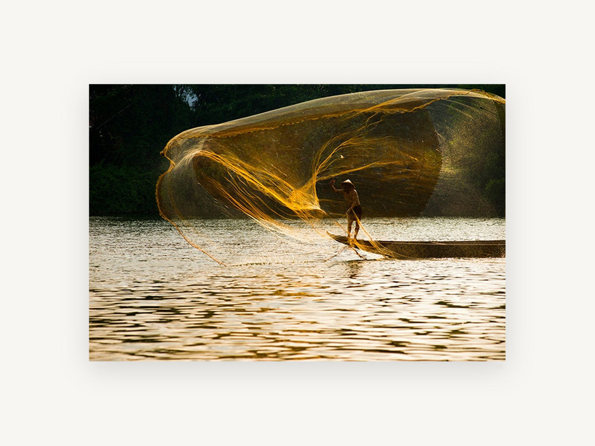Golden Net Cast, fisherman casting net river photograph, landscape canvas wall art print, front view