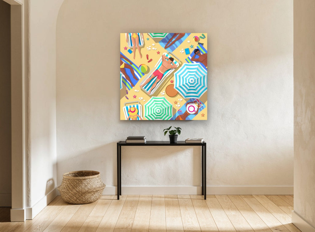 Sunbathers From Above coastal canvas print on the wall of a hallway