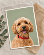 Unframed pet portrait print in its protective sleeve, ready to frame