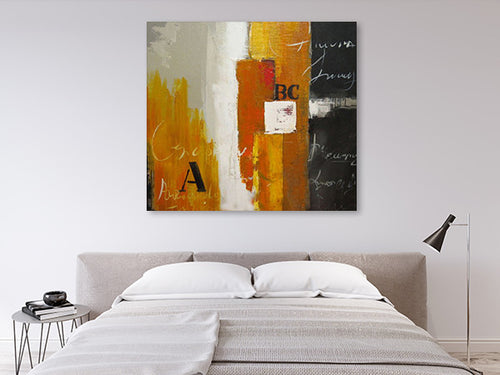 Amber Alphabet oil painting hanging on a wall in a styled room