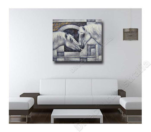 Amour oil painting hanging on a wall in a styled room